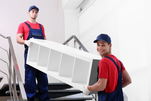 Professional movers handling office relocation in Bow Storage