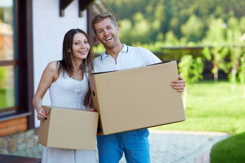 Happy customers with their successful move in Bow