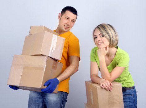 Experienced team loading furniture onto a moving truck