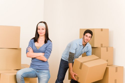 Professional movers assisting with a residential move in Bow